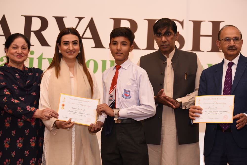 Scholarship students receiving their awards