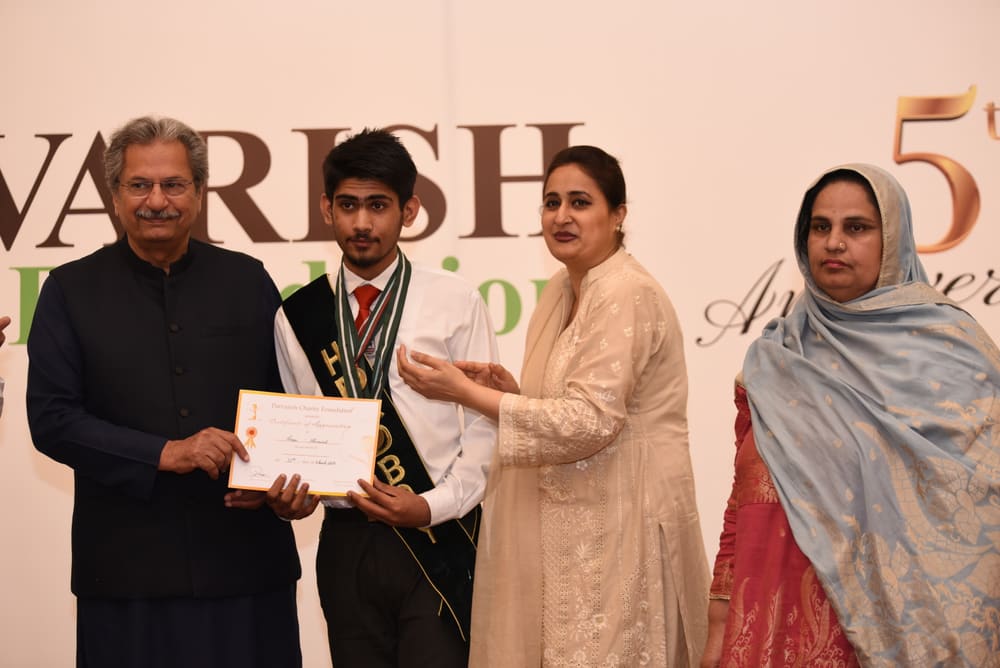 Scholarship students receiving their awards