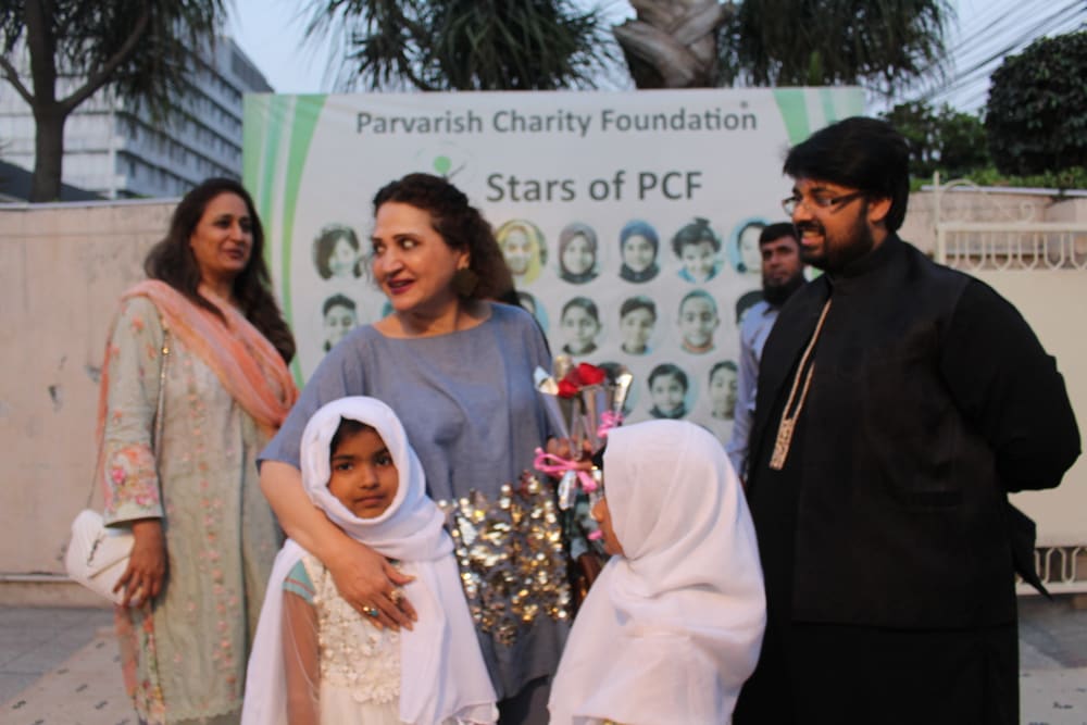 Guests visiting the children at Parvarish