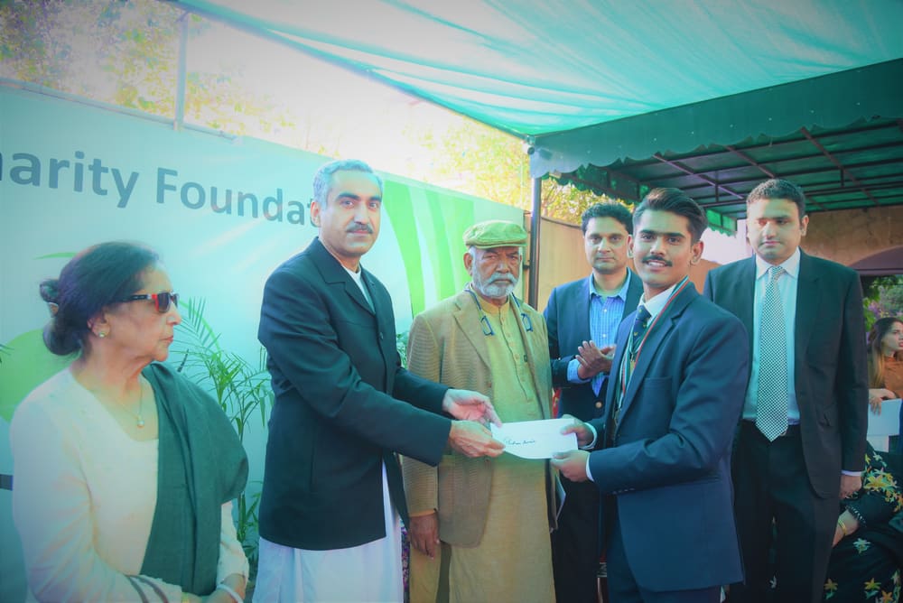 Financial assistance being handed over