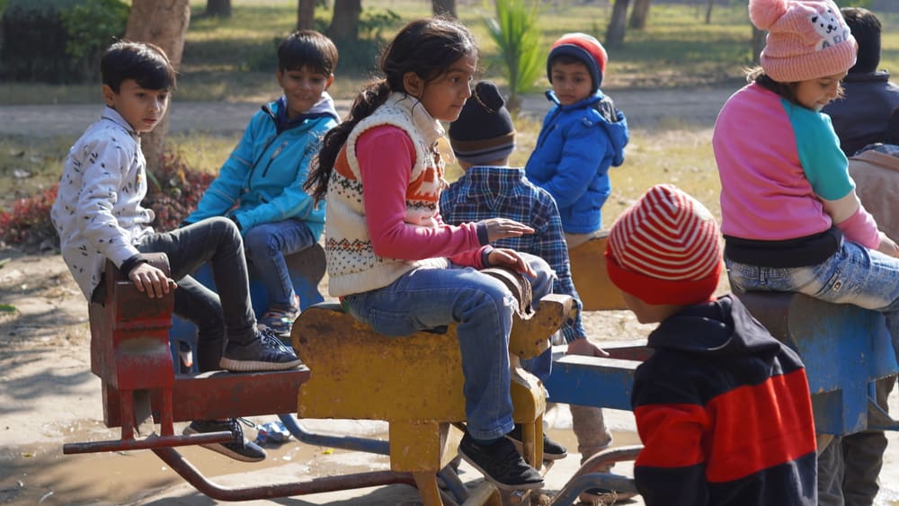 Children sharing a meal at a Parvarish gathering