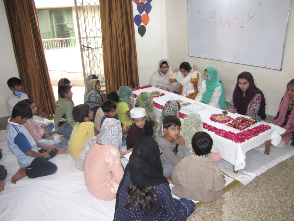 Children sharing a meal at a Parvarish gathering