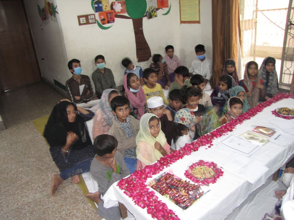 Children sharing a meal at a Parvarish gathering